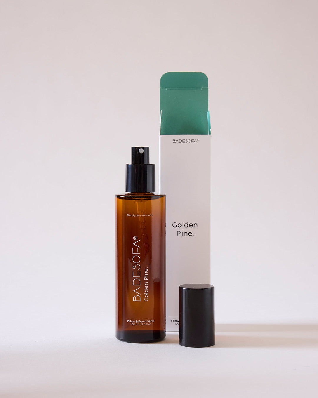BADESOFA accessory, a 100 ml pillow and room spray label as 'Golden Pine' on a plain white background | 